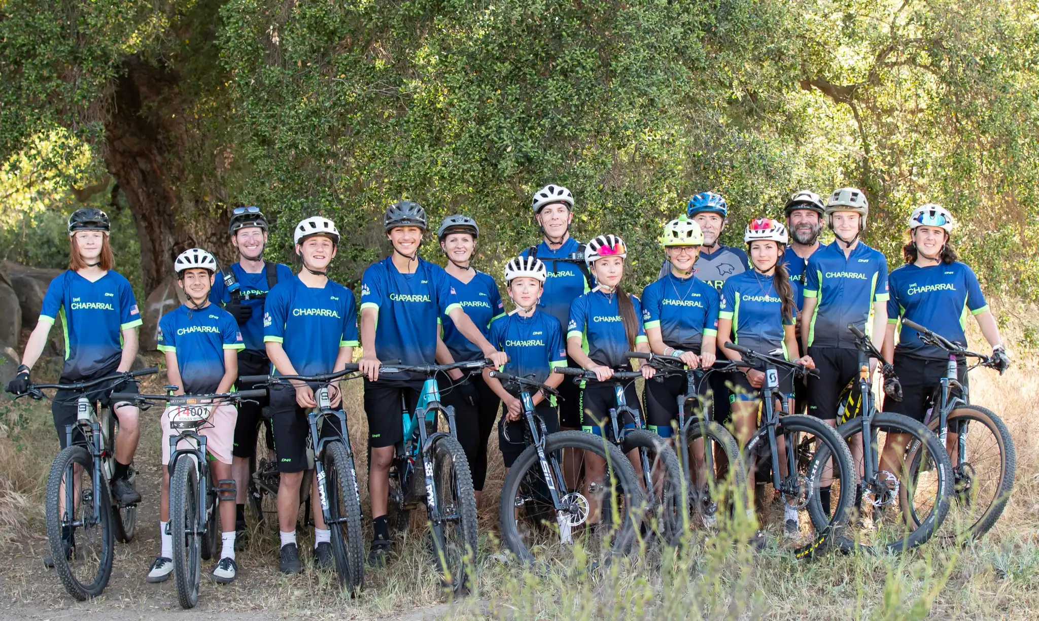 The Chaparral MTB team lined up with their bikes on a Temecula trail